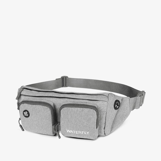 The light gray Fanny Pack Plus is roomy with multiple compartments and is durable, water-resistant and hard-wearing