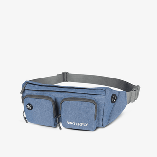 The Fanny Pack Plus in denim blue is roomy and has multiple compartments, plus it's durable, water-resistant, and hard-wearing