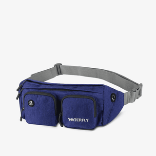 The Fanny Pack Plus in dark blue is roomy and has multiple compartments, and is durable, water-resistant, and hard-wearing