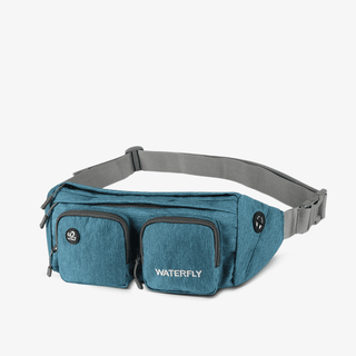 The Fanny Pack Plus in peacock blue is roomy, has multiple compartments, and is durable, water-resistant, and hard-wearing